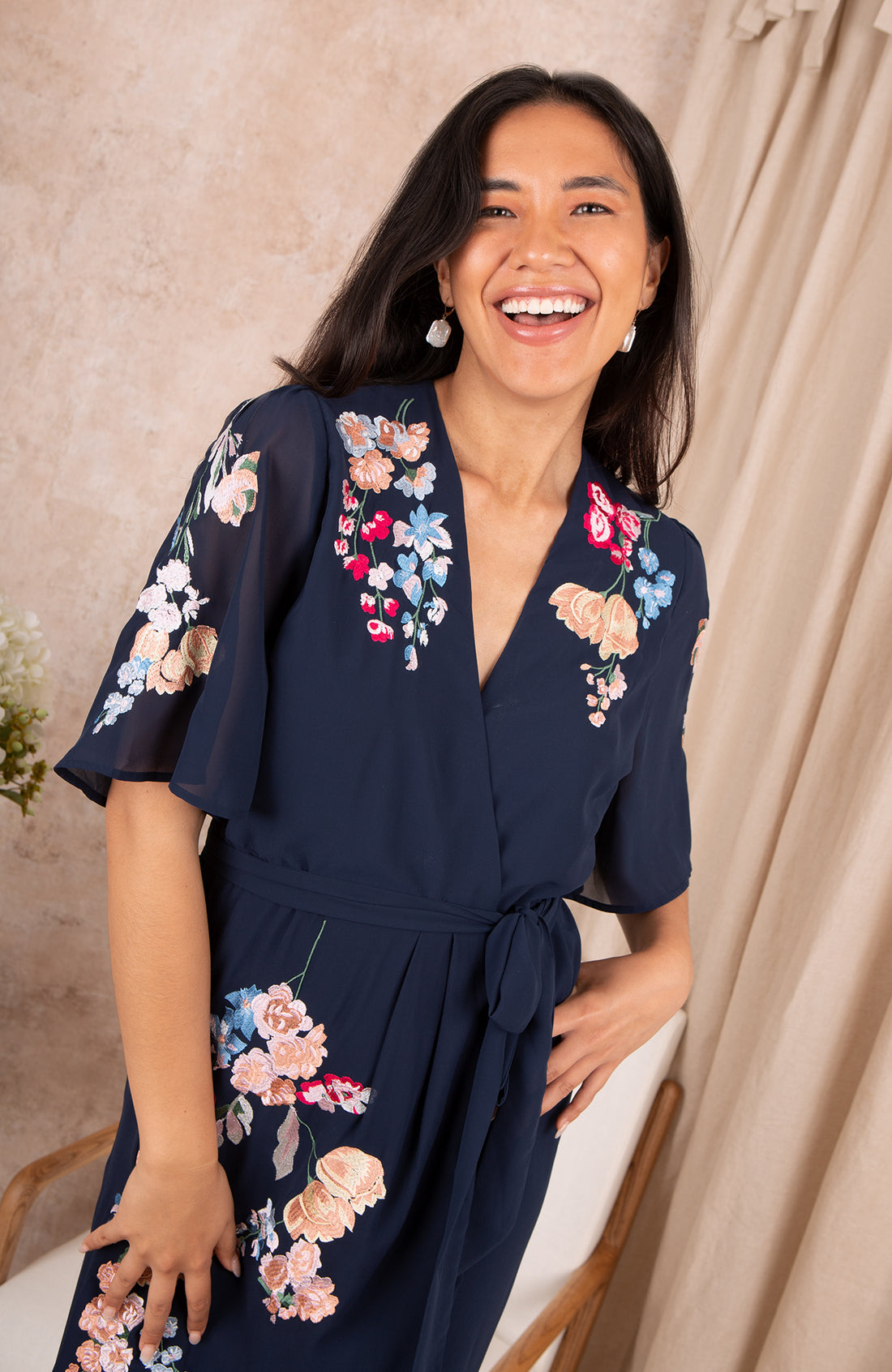 THE CLAIRE EMBROIDERED FLUTTER SLEEVE MIDI WRAP DRESS